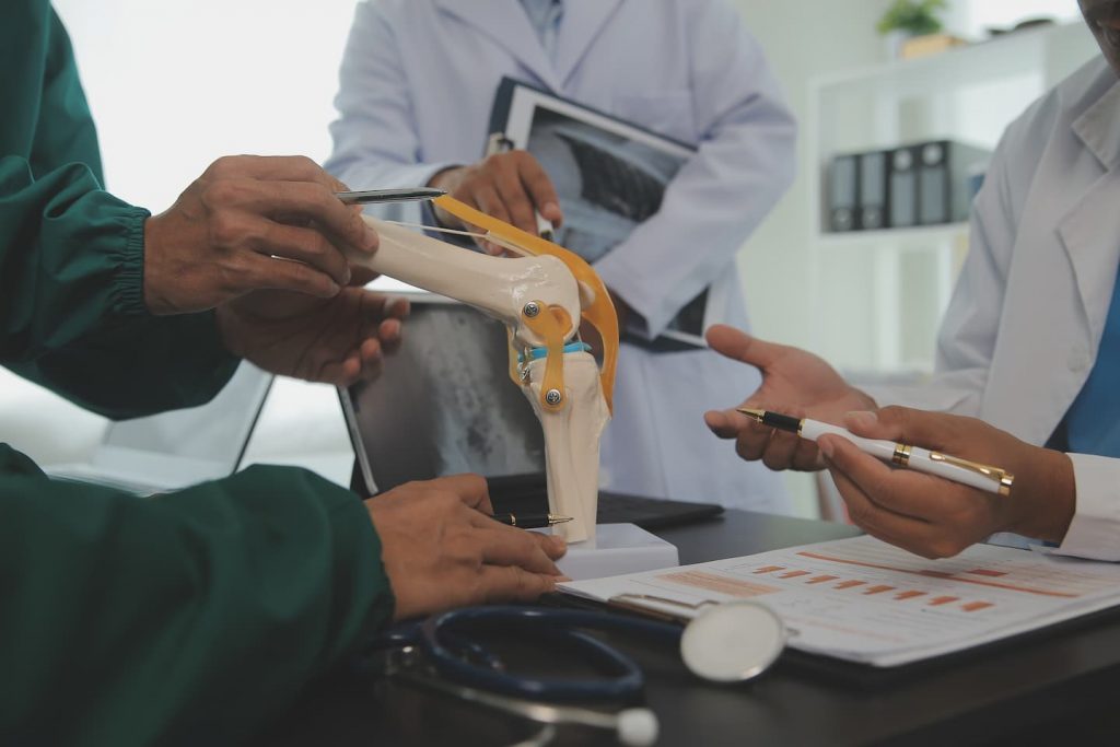 group-doctors-reading-document-meeting-room-hospital-1.jpg